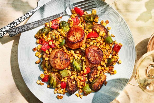 Blackened scallops with charred corn and Brussels sprouts [Saint K.P.]