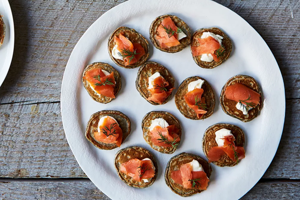Blini with crème fraîche and smoked salmon