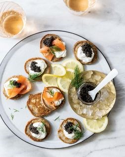 Blini with smoked salmon and caviar