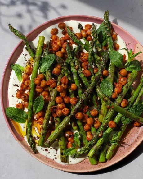 Blistered asparagus with chili-sumac chickpeas & whipped feta