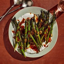 Blistered asparagus with labneh and harissa 