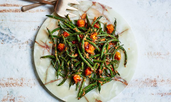 Blistered green beans with tomato-almond pesto