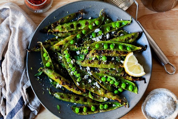 Blistered peas-in-the-pod with lemon and salt