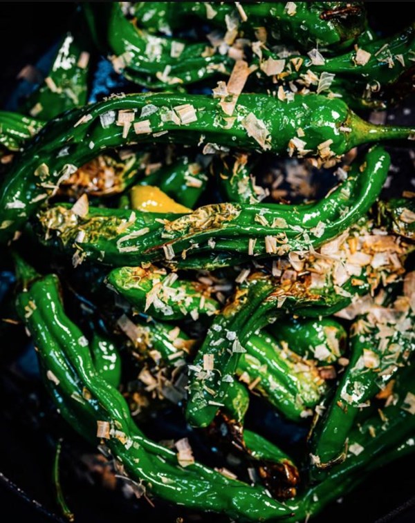 Blistered shishito peppers with bonito flakes