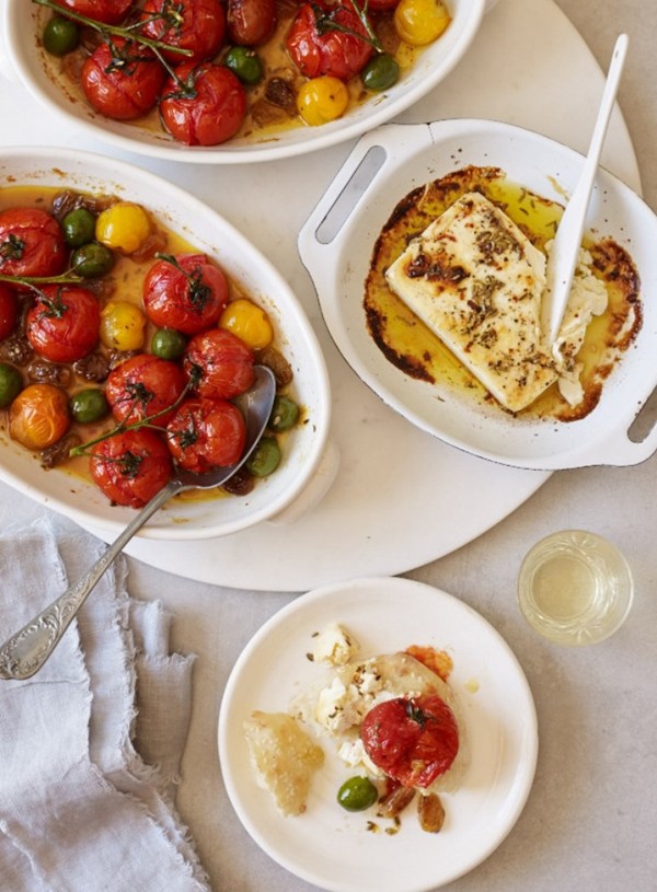 Blistered tomatoes with orange and black olives