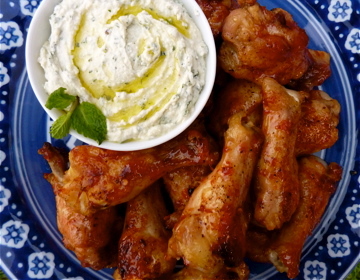 Blood orange glazed chicken wings with minted whipped feta
