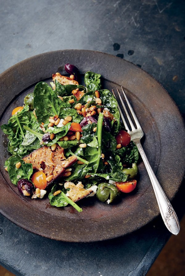 Bloomsdale spinach salad with honey-garlic dressing, feta and pine nuts