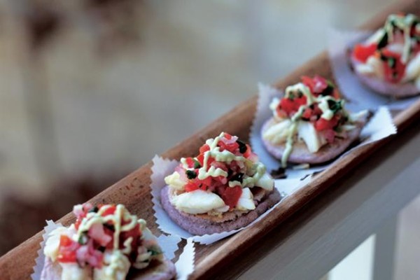 Blue corn blinis with crab and avocado crema