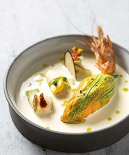 Blue shrimp zucchini blossoms with cardamom jus