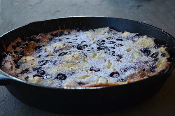 Blueberry Dutch baby with rosemary and fresh goat cheese