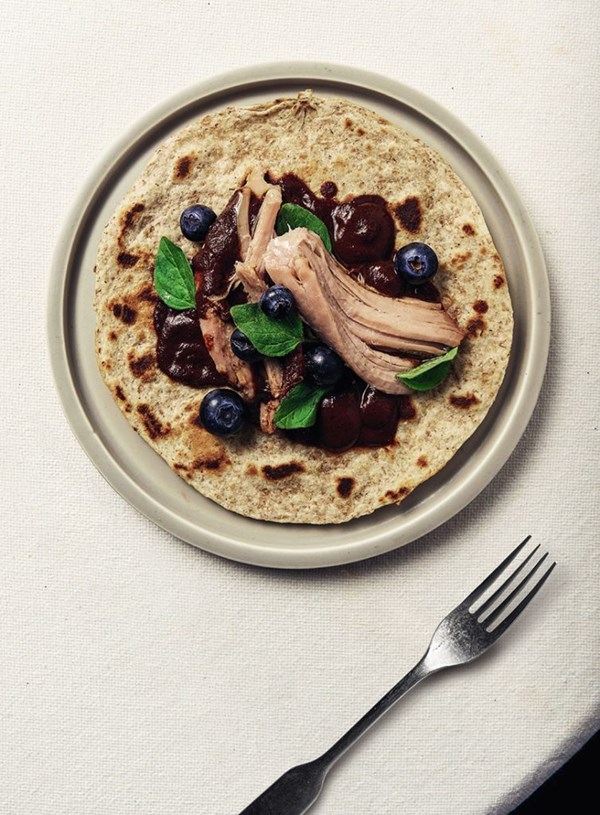 Blueberry mole with pork shoulder