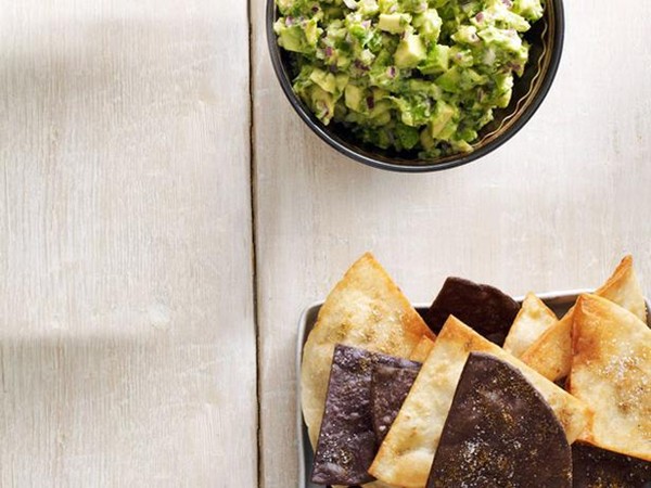 Bobby Flay's guacamole with cumin-dusted tortilla chips