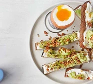 [Boiled egg with] avocado & dukkah rye soldiers