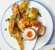 [Boiled egg with] turmeric & chilli butter naan soldiers 
