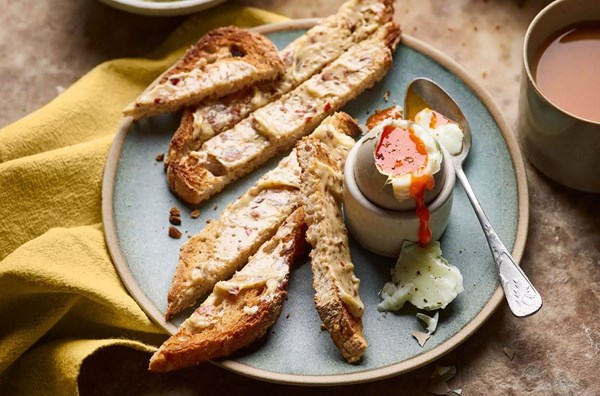 Boiled eggs with anchovy, fennel seed & chilil butter soldiers