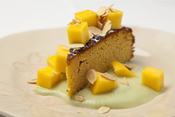 Boiled orange cake with coconut custard [Peter Gordon]