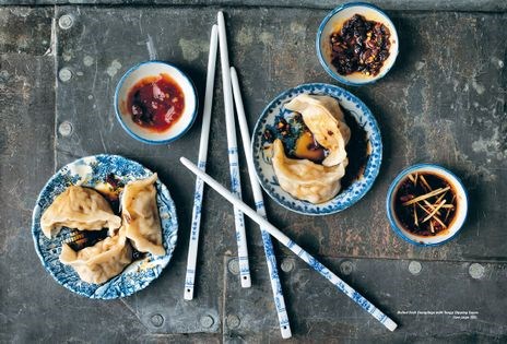 Boiled pork dumplings with tangy dipping sauce