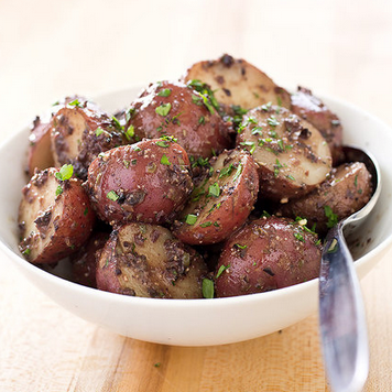 Boiled potatoes with black olive tapenade