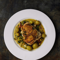 Boneless skin-on chicken breast bundles stuffed with julienned leeks and carrots