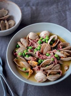 Bowl of clams, ham and peas