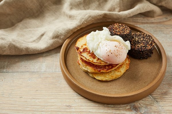 Boxty with black pudding and poached eggs