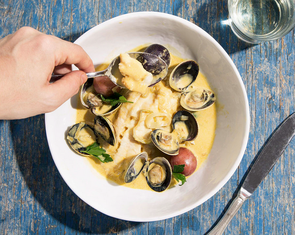 Braised bass and clams in white wine and cream