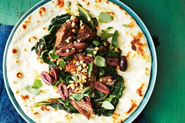 Braised beef short ribs with silverbeet and haloumi crumbs