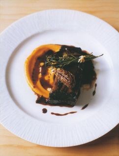 Braised beef with carrot purée and wholegrain mustard