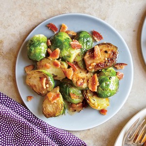 Braised Brussels sprouts with cider and bacon