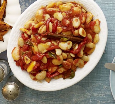 Braised butter beans in olive oil, oregano and tomato