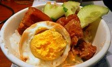 Braised caramelised pork with eggs