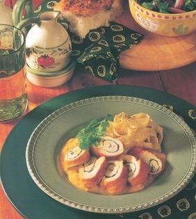Braised chicken and coriander roulade with turmeric and almonds