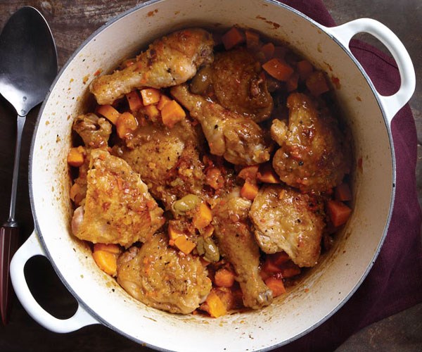 Braised chicken legs with prosciutto, sweet potatoes, and olives