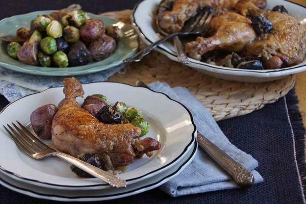 Braised chicken legs with prunes, brandy, and Dijon