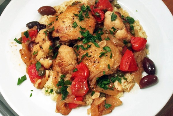 Braised chicken thighs and cauliflower with olives and capers