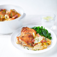 Braised chicken thighs with Jersey Royals, bacon and cream