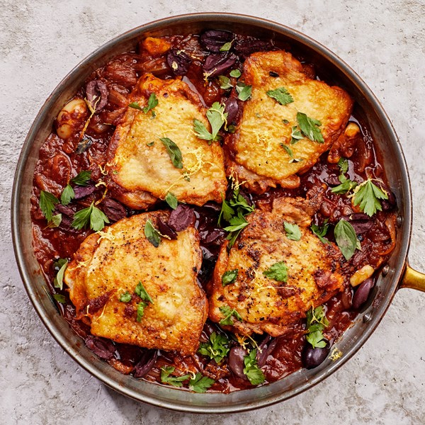 Braised chicken thighs with olives and herbs