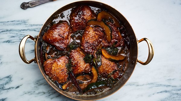 Braised chicken thighs with squash and mustard greens