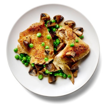 Braised chicken with mushrooms and peas