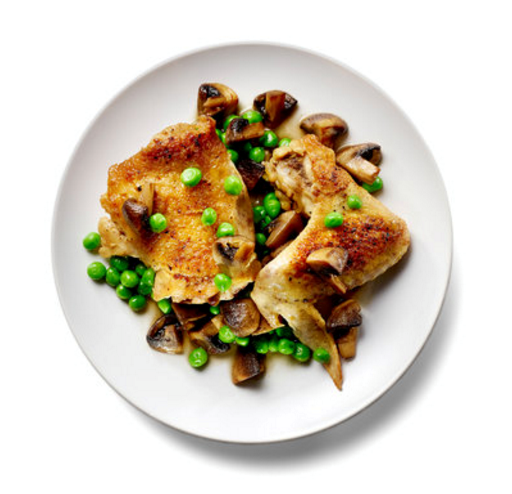 Braised chicken with mushrooms and peas