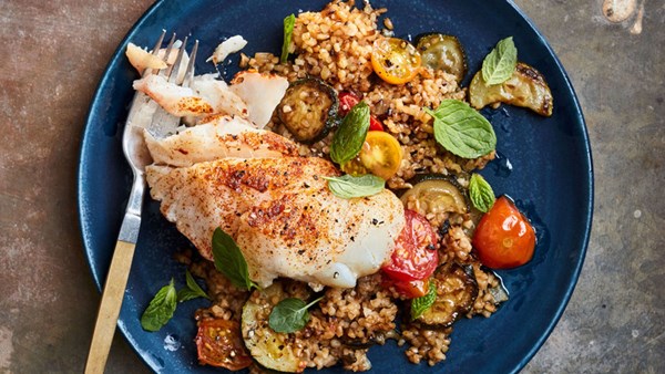 Braised cod and bulgur with zucchini and tomatoes