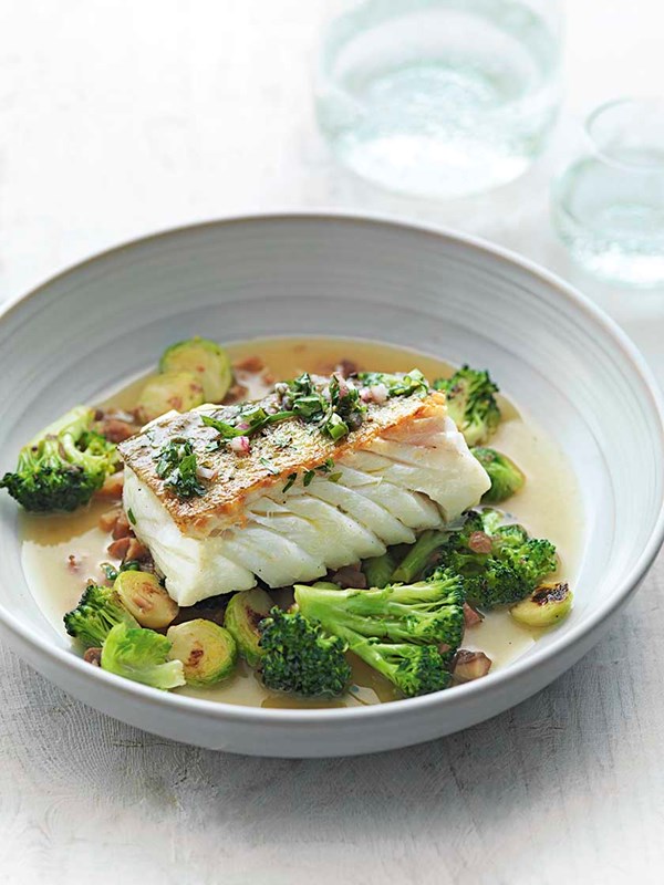 Braised cod with herb vinaigrette, toasted broccoli, sprouts and chestnuts