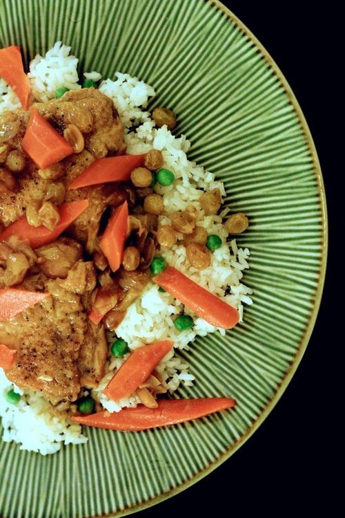 Braised curry chicken with golden raisins and peanuts