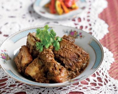 Braised duck in thick tamarind gravy (Itek sio)