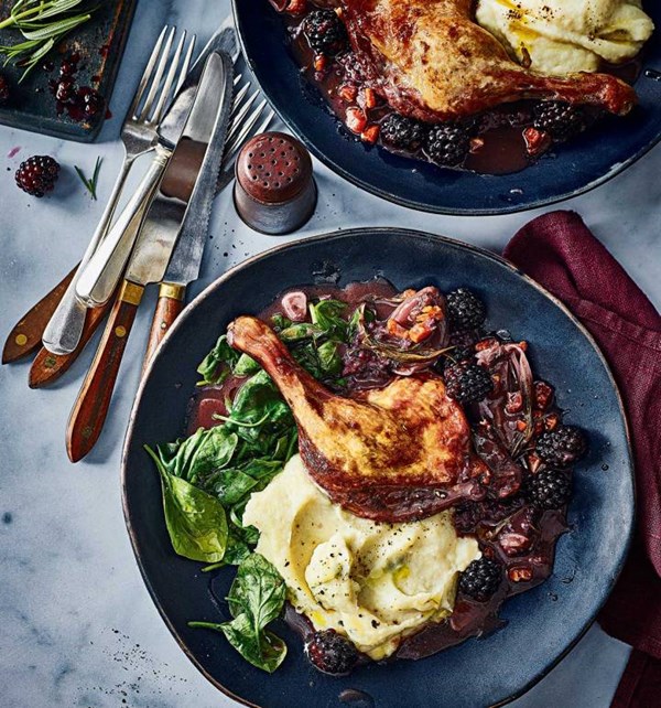 Braised duck legs with cranberries and celeriac mash