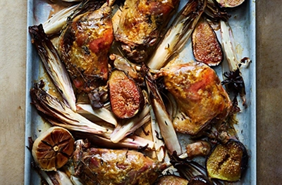 Braised duck legs with sherry, figs & chicory