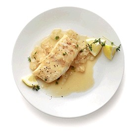 Braised fish with lemon and thyme