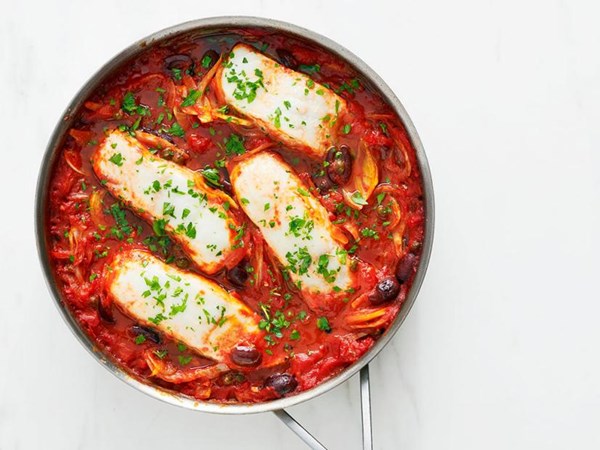 Braised halibut with fennel in puttanesca sauce