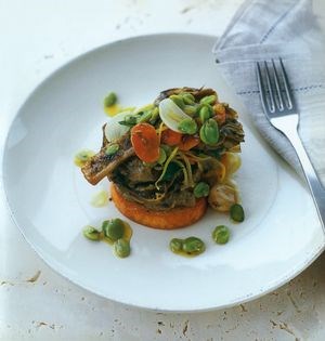 Braised herb-stuffed globe artichokes