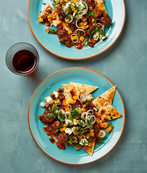 Braised lamb neck with persimmon and feta salsa